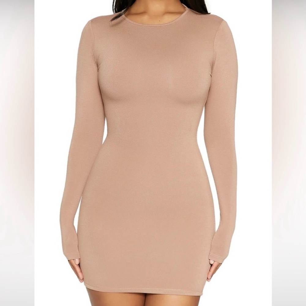 Naked wardrobe got you in a bind long sleeve mini dress